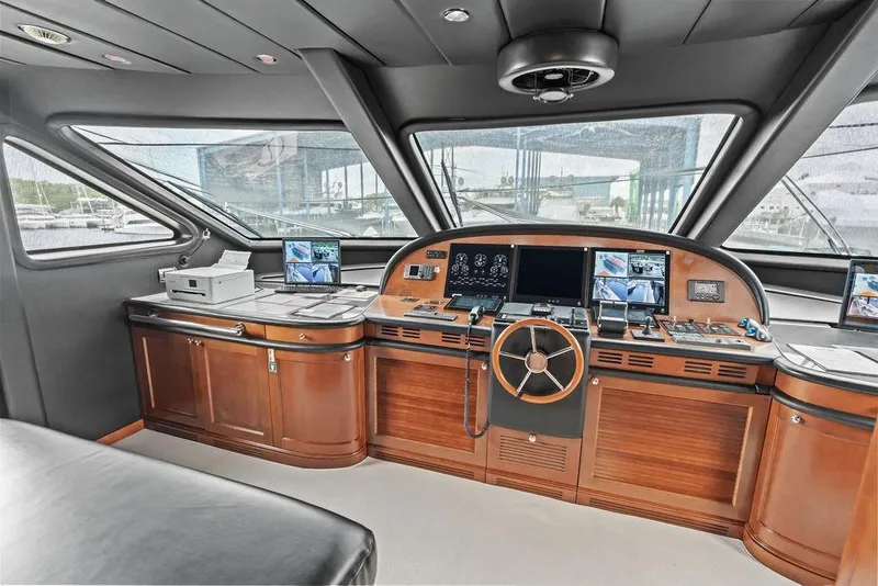 Slide: The Image of Luxurious 2008 Benetti Classic yacht helm with wood finish and advanced navigation systems. - 54