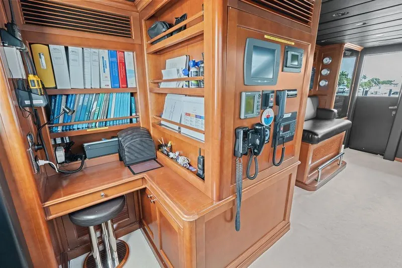 Slide: The Image of Luxurious 2008 Benetti Classic yacht interior with navigation equipment and organized workspace. - 56