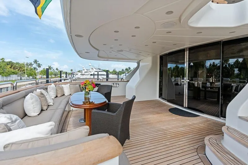 Slide: The Image of Luxurious 2008 Benetti Classic yacht deck with elegant seating and ocean view. - 6