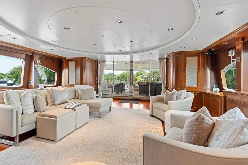 Slide: The Image of Luxurious interior of 2008 Benetti Classic yacht with elegant seating and wooden accents. - 60