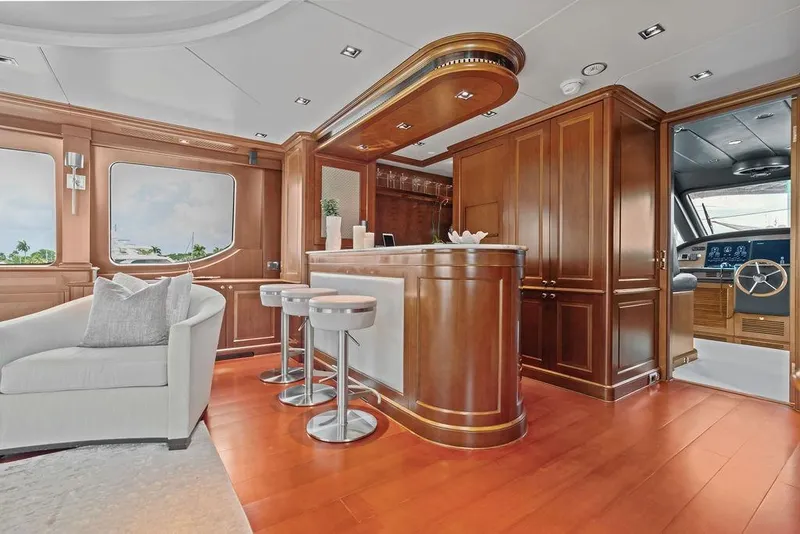 Slide: The Image of Luxurious interior of a 2008 Benetti Classic yacht featuring elegant wood finishes and modern seating. - 61