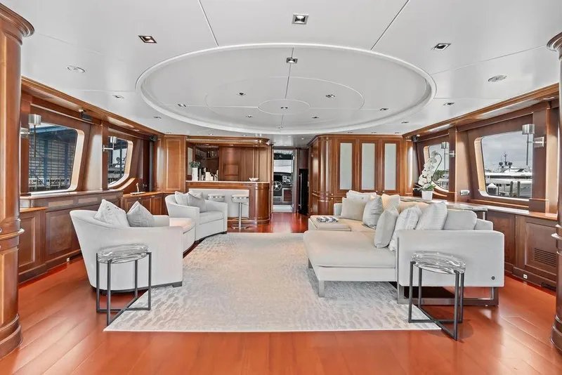 Slide: The Image of Luxurious interior of 2008 Benetti Classic yacht with elegant wood paneling and plush seating. - 62