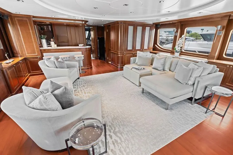 Slide: The Image of Luxurious interior of a 2008 Benetti Classic yacht with elegant seating and wooden accents. - 63