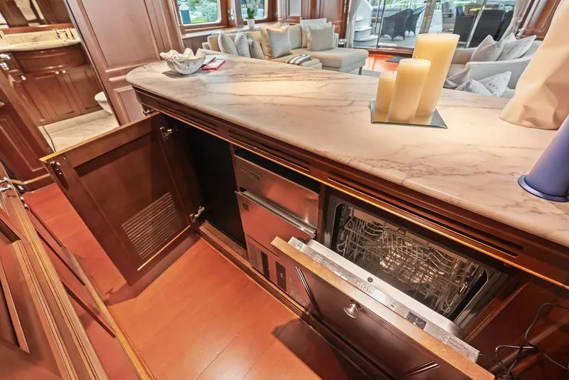 Slide: The Image of Luxurious Benetti Classic 2008 yacht interior with open cabinetry and modern appliances. - 64