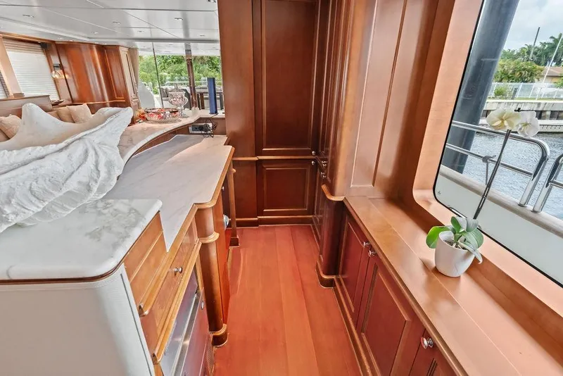 Slide: The Image of Luxurious 2008 Benetti Classic yacht interior with elegant wood paneling and large windows. - 66