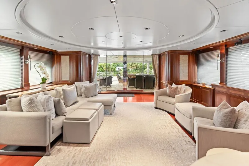 Slide: The Image of Luxurious interior of a 2008 Benetti Classic yacht with elegant seating and wood accents. - 67