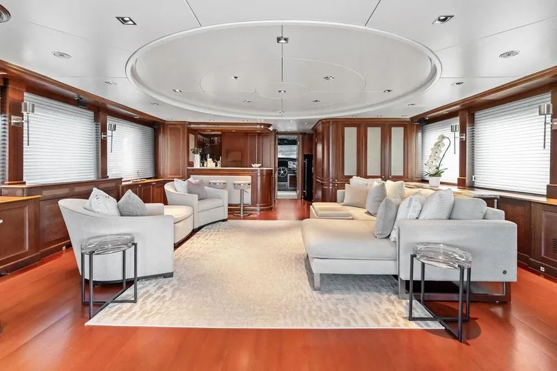 Slide: The Image of Luxurious interior of a 2008 Benetti Classic yacht with elegant seating and wooden accents. - 70