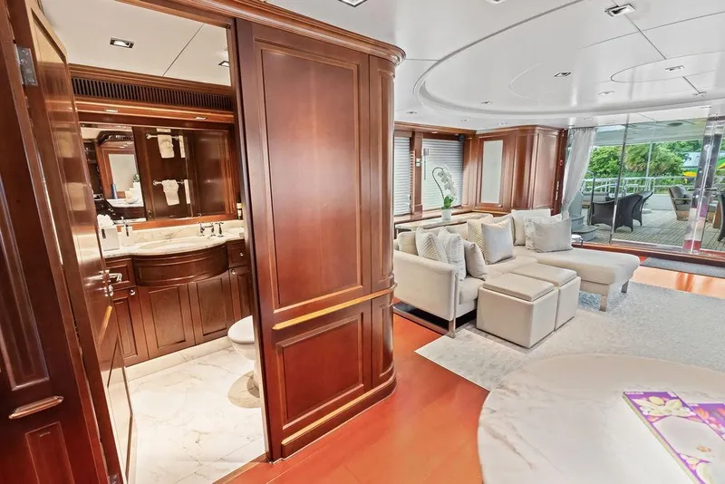 Slide: The Image of Luxurious 2008 Benetti Classic yacht interior with elegant wood paneling and plush seating. - 73