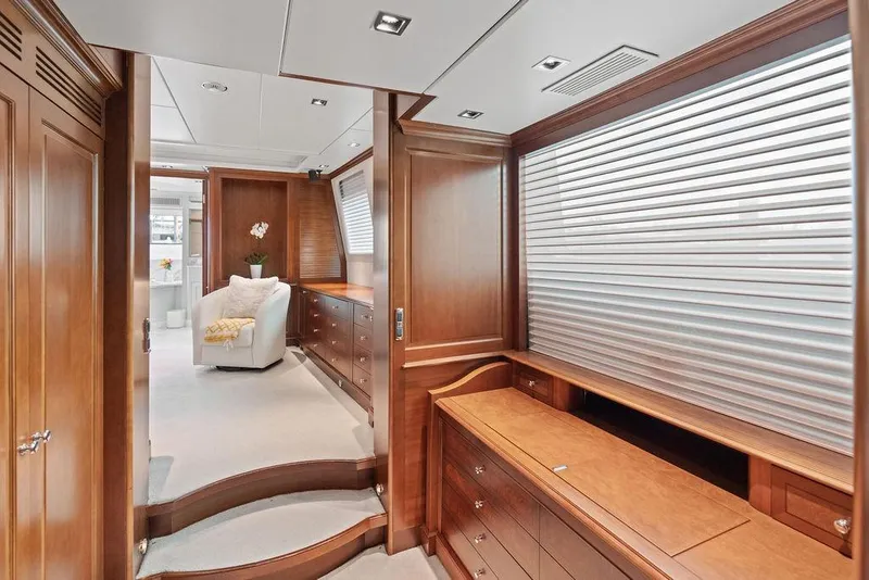 Slide: The Image of Luxurious interior of a 2008 Benetti Classic yacht with elegant wood finishes. - 76