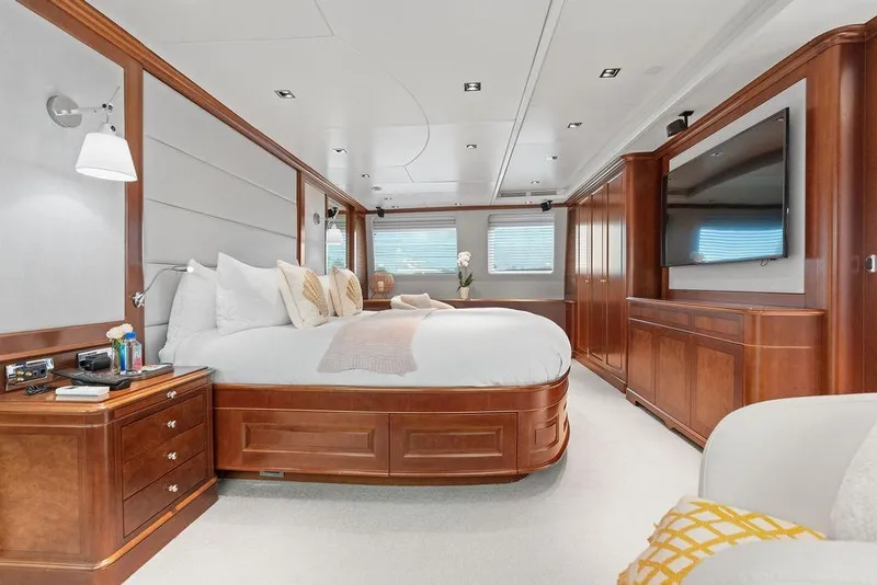 Slide: The Image of Luxurious 2008 Benetti Classic yacht bedroom with elegant wood furnishings and modern decor. - 78