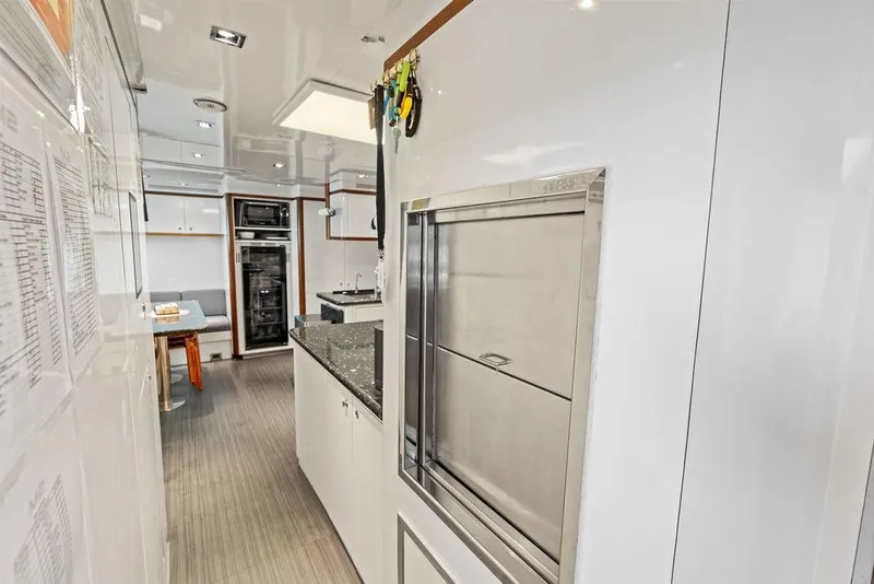Slide: The Image of Luxurious kitchen interior of 2008 Benetti Classic yacht with modern appliances and sleek design. - 92