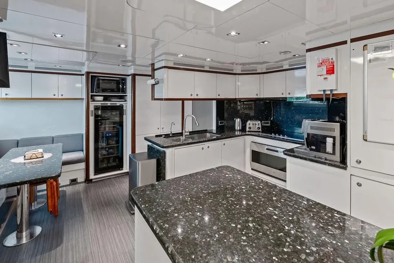Slide: The Image of Luxurious 2008 Benetti Classic yacht kitchen with modern appliances and sleek design. - 93