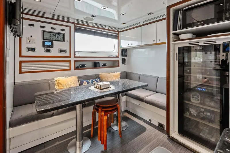 Slide: The Image of Luxurious 2008 Benetti Classic yacht interior with modern dining area and sleek design. - 97