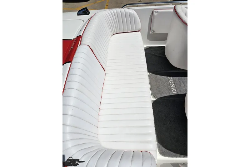 Slide: The Image of 1997 Donzi 18 Classic boat interior with white and red seating. - 54