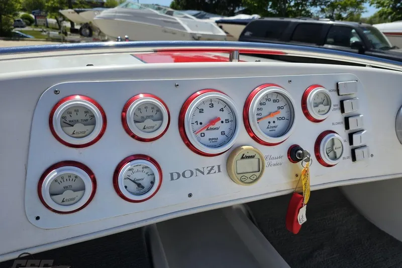 Slide: The Image of Dashboard of a 1997 Donzi 18 Classic boat with Livorsi gauges and controls. - 65