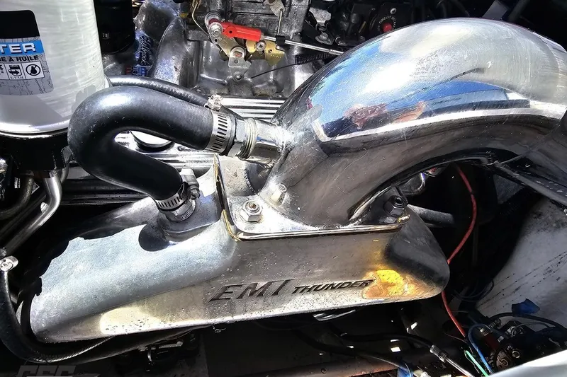 Slide: The Image of Engine compartment of a 1997 Donzi 18 Classic boat with EMI Thunder components. - 80