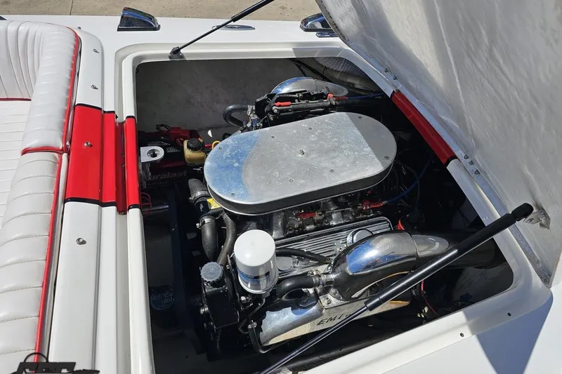Slide: The Image of Engine compartment of a 1997 Donzi 18 Classic boat, showcasing detailed components. - 81