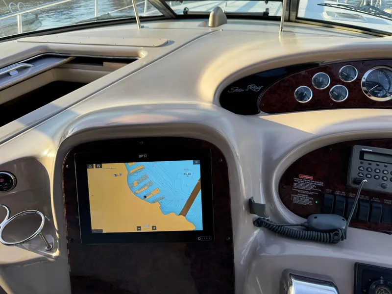 Slide: The Image of Dashboard of 2001 Sea Ray 380 Sundancer with navigation system. - 17