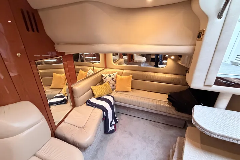 Slide: The Image of Luxurious interior of 2001 Sea Ray 380 Sundancer yacht with plush seating and elegant decor. - 25