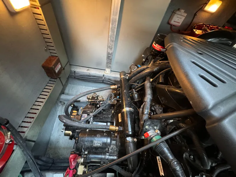 Slide: The Image of Engine compartment of a 2001 Sea Ray 380 Sundancer boat. - 43