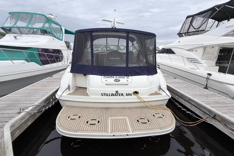 Slide: The Image of 2001 Sea Ray 380 Sundancer docked in Stillwater, MN, with covered cockpit. - 5