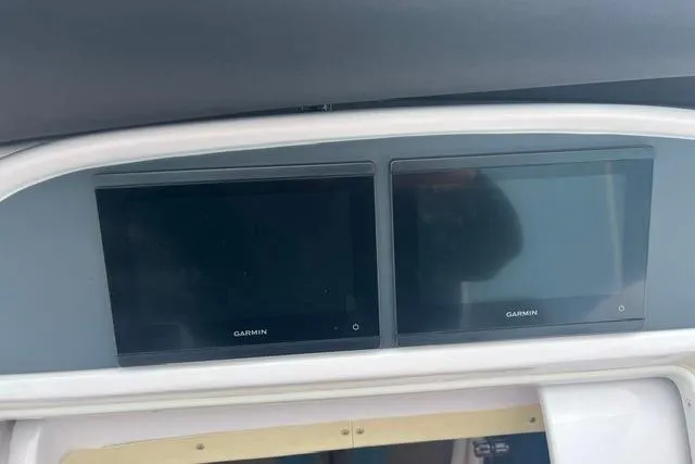 Slide: The Image of Dashboard of a 2000 Donzi 33 ZX with dual Garmin displays. - 12