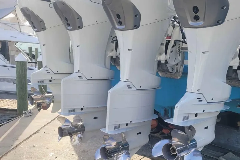 Slide: The Image of Four powerful outboard motors on a 2014 SeaHunter 45 Tournament boat. - 21