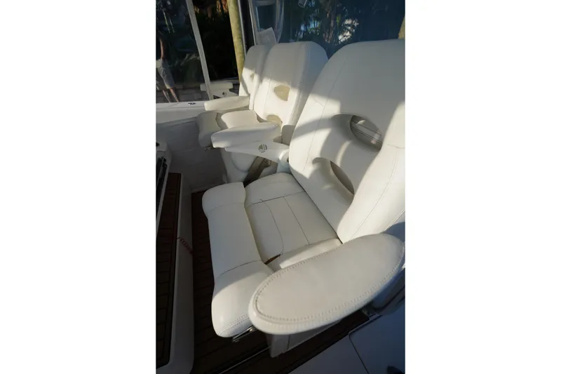 Slide: The Image of Luxurious white seating on 2014 SeaHunter 45 Tournament boat, showcasing comfort and style. - 6
