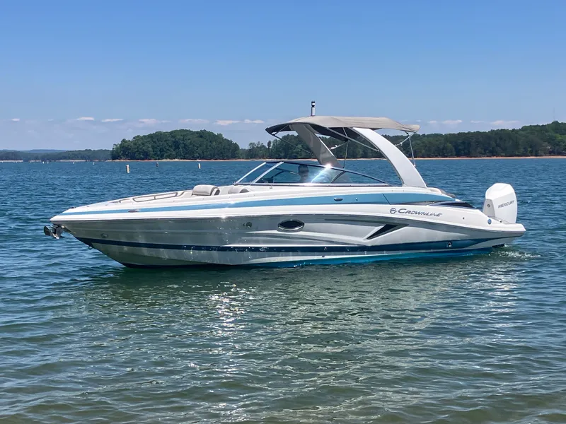 The Image of 2023 Crownline 270 XSS boat on calm water. - 0