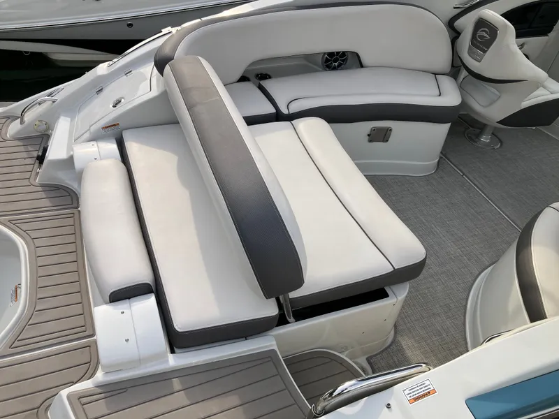 Slide: The Image of Interior of 2023 Crownline 270 XSS featuring luxurious seating. - 12