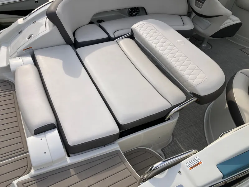 Slide: The Image of Interior of 2023 Crownline 270 XSS featuring luxurious seating. - 14