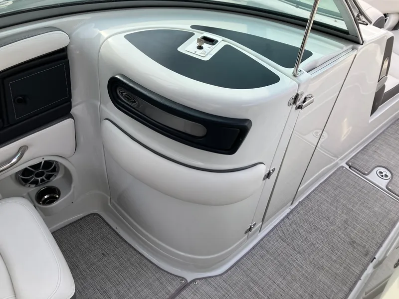 Slide: The Image of Interior of 2023 Crownline 270 XSS with sleek design features. - 19