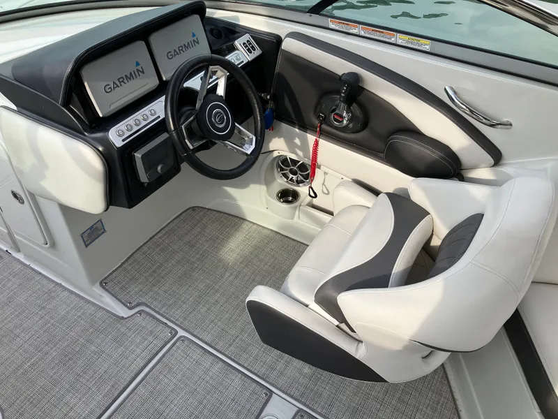 Slide: The Image of Interior of 2023 Crownline 270 XSS with Garmin displays. - 20