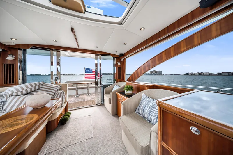 Slide: The Image of Luxurious interior of 2011 Hunt 52 yacht with elegant wood finish and waterfront view. - 10