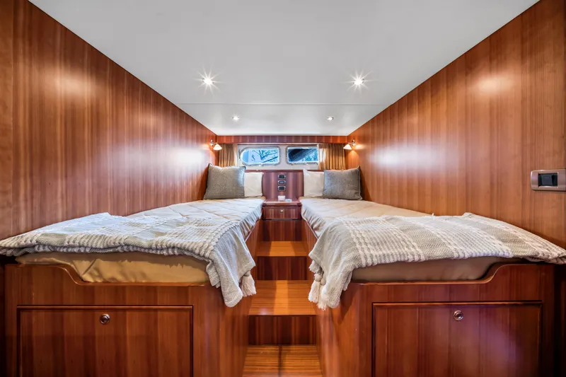 Slide: The Image of Luxurious twin cabin interior of 2011 Hunt 52 yacht with wooden finish. - 21