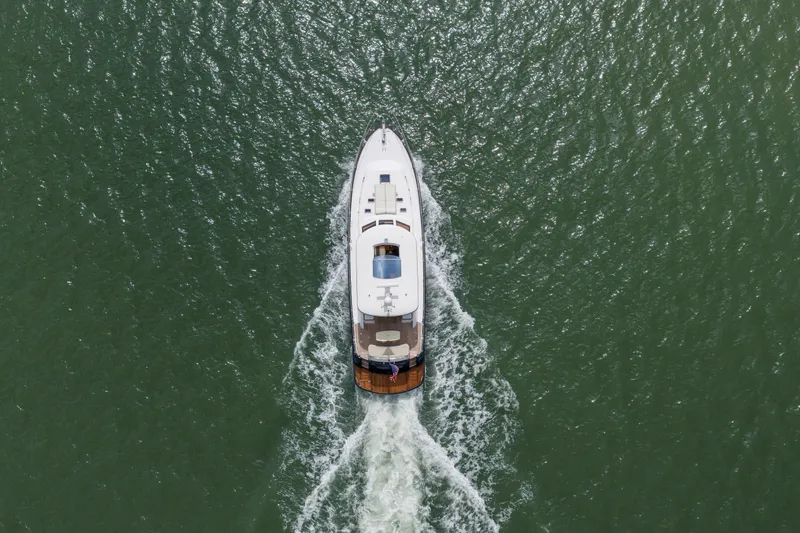 Slide: The Image of Aerial view of 2011 Hunt 52 yacht cruising on open water. - 6