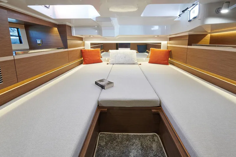 Slide: The Image of Manufacturer Provided Image: 2022 Jeanneau Leader 10.5 WA Series 2 cabin interior with cozy bedding and modern design. - 9