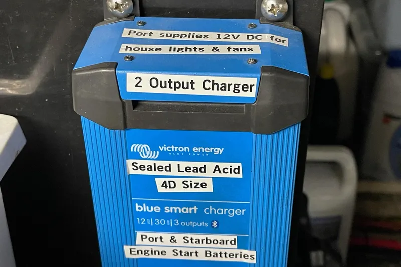 Slide: The Image of Victron Energy blue smart charger for Hatteras 48 Long Range Cruiser, 1976 model. - 16
