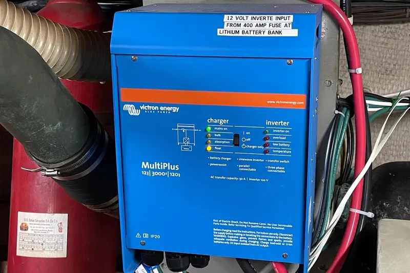 Slide: The Image of Victron Energy MultiPlus inverter in 1976 Hatteras 48 Long Range Cruiser engine room. - 17