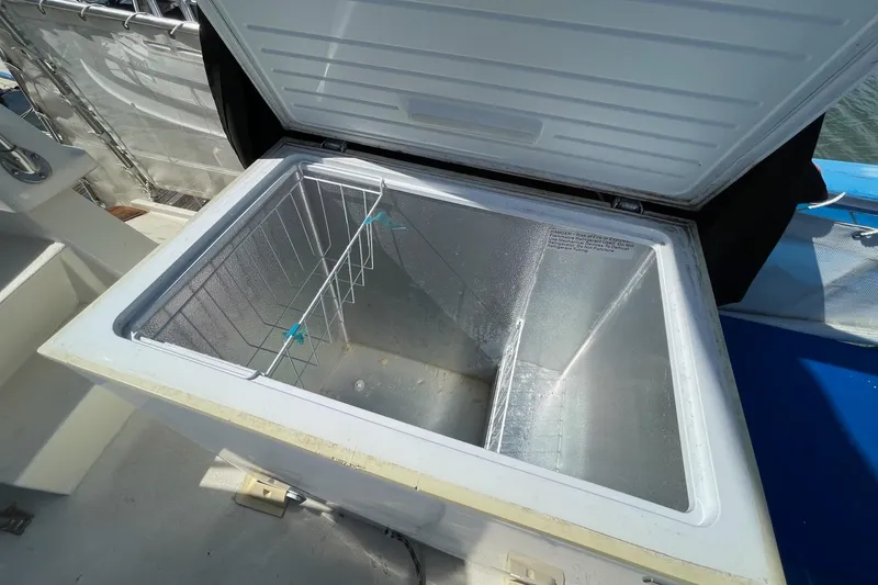 Slide: The Image of Open freezer on 1976 Hatteras 48 Long Range Cruiser boat deck. - 39