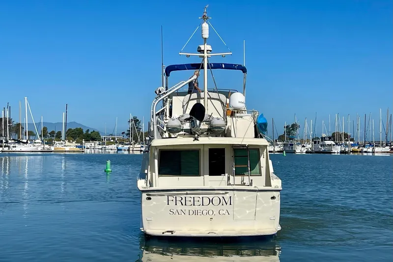 Slide: The Image of 1976 Hatteras 48 Long Range Cruiser docked in San Diego marina. - 6