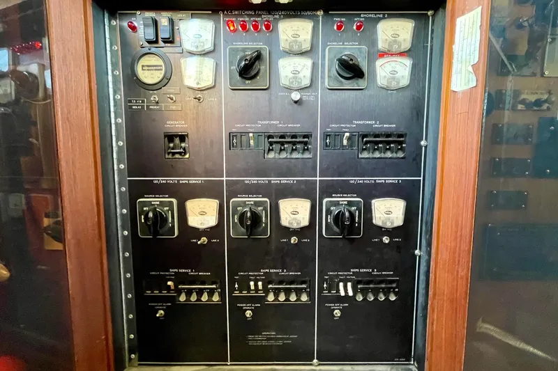 Slide: The Image of Electrical control panel on a 1976 Hatteras 48 Long Range Cruiser yacht. - 65