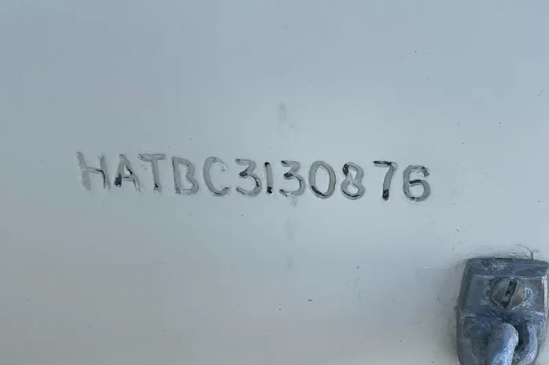 Slide: The Image of Hull identification number on 1976 Hatteras 48 Long Range Cruiser. - 69