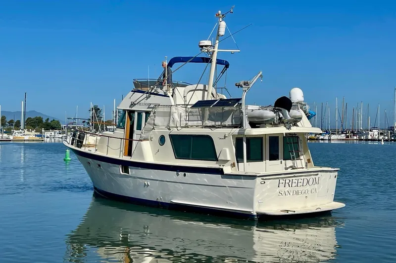 Slide: The Image of 1976 Hatteras 48 Long Range Cruiser docked in San Diego marina. - 7