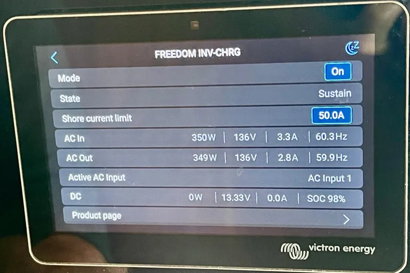 Slide: The Image of Display screen showing Victron Energy system settings on a 1976 Hatteras 48 Long Range Cruiser. - 72