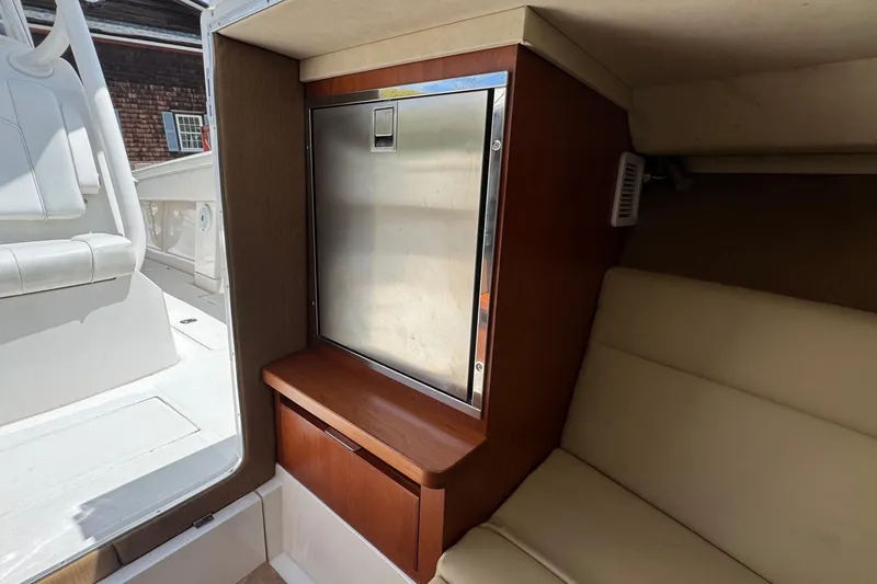Slide: The Image of Interior of 2013 Jupiter 32 Cuddy boat with seating and storage area. - 38