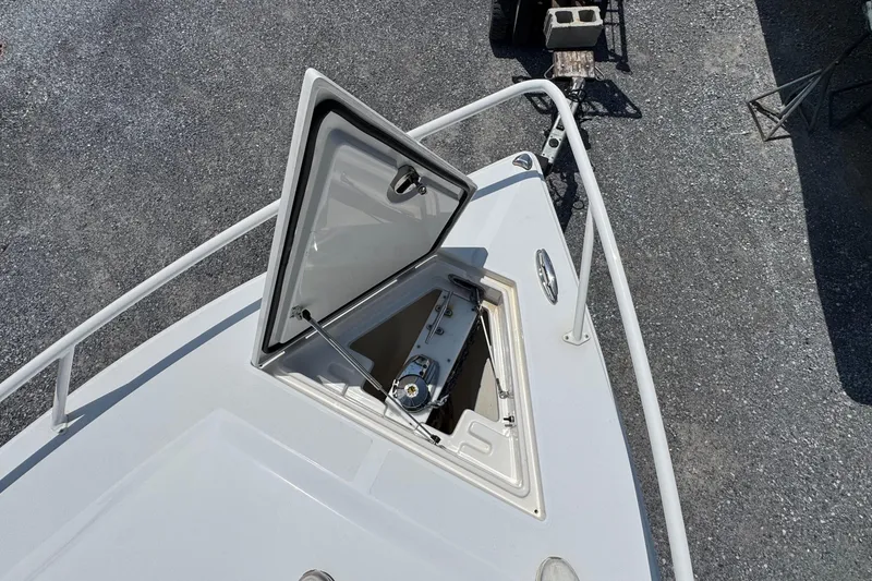 Slide: The Image of Open hatch on 2013 Jupiter 32 Cuddy boat, revealing anchor storage compartment. - 41