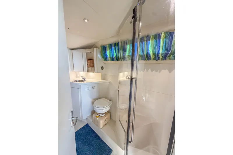 Slide: The Image of Bathroom interior of 1994 Carver 380 Santego yacht with shower and sink. - 34