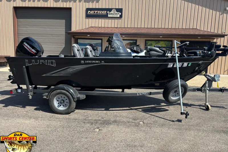 Slide: The Image of 2023 Lund 1650 Rebel XL SS fishing boat on trailer at D&R Sports Center. - 1