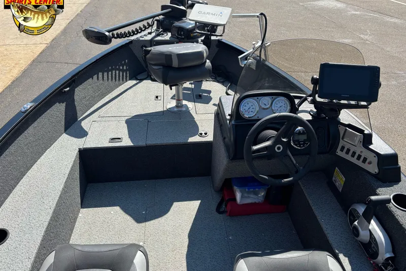 Slide: The Image of 2023 Lund 1650 Rebel XL SS boat interior with steering console and Garmin electronics. - 5